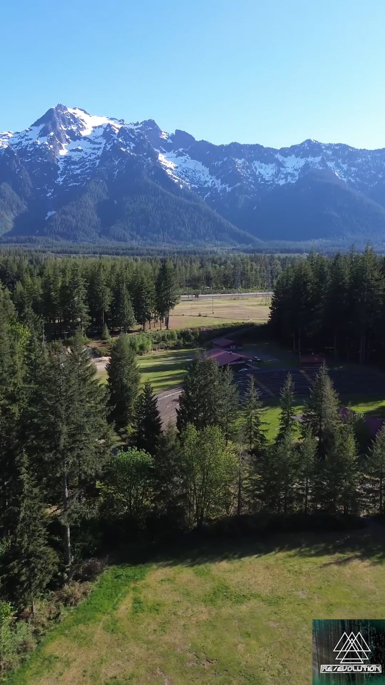 Whitehorse Mountain above the trees and amphitheater at Darrington Music Park